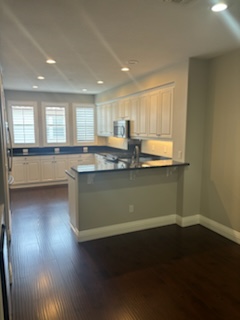 a kitchen with a counter top and a sink